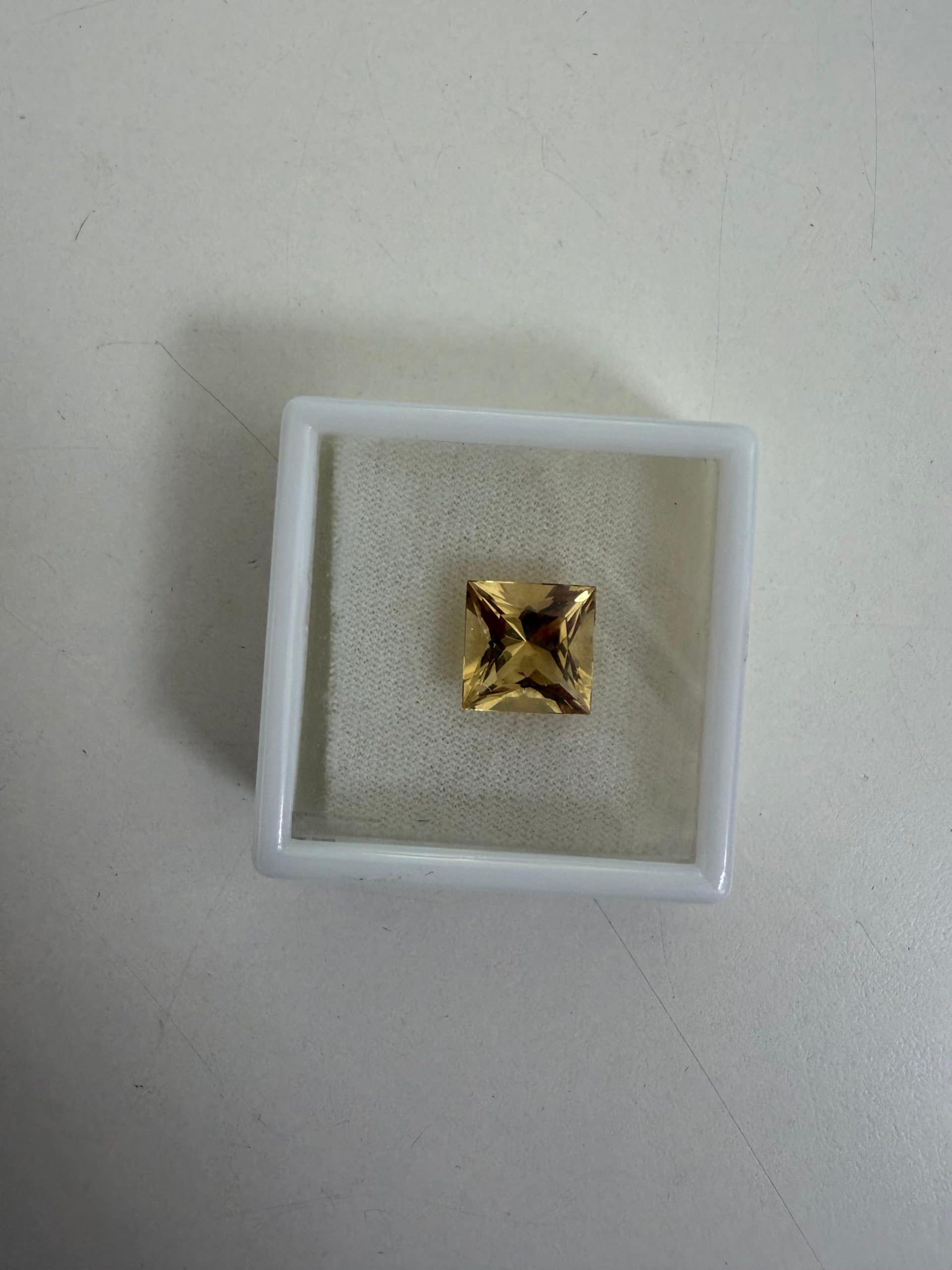 Citrine 5.28ct Square Cut Gemstone 1 Natural citrine gemstone, 5.28 carats, square cut. Warm golden colour ideal for bespoke jewellery. Available at Gecko Jewellers.